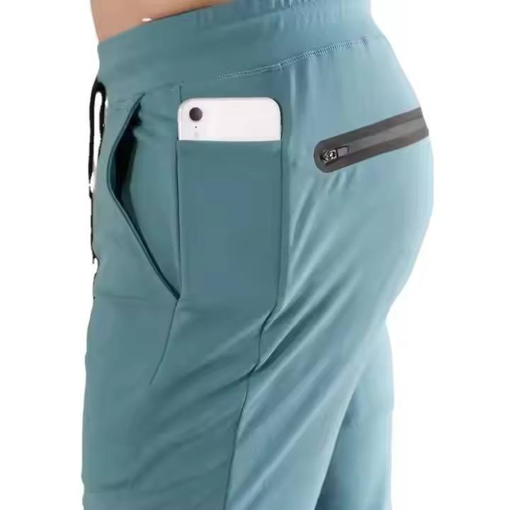 Men Smart Casual Lightweight Skinny Gym Pants with Mid Waist Coolfeeling Breathable Phone Pockets for Running Workout Sweatpants (1)