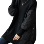 Close-up showing the sleeve construction and knitted fabric texture.